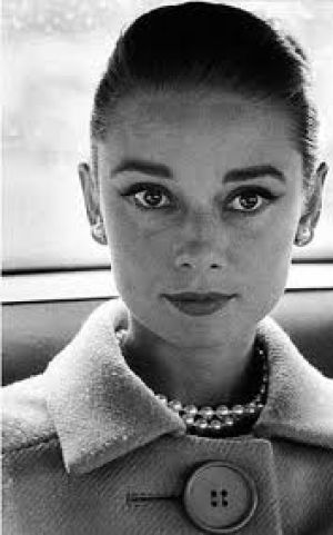 Audrey Hepburn in coat with pearls.jpg